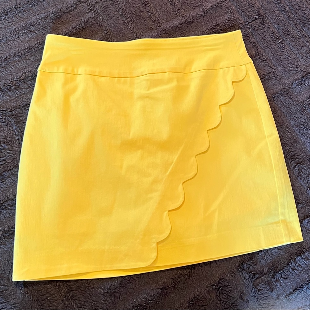 Yellow mini skirt with shorts, Size 8
